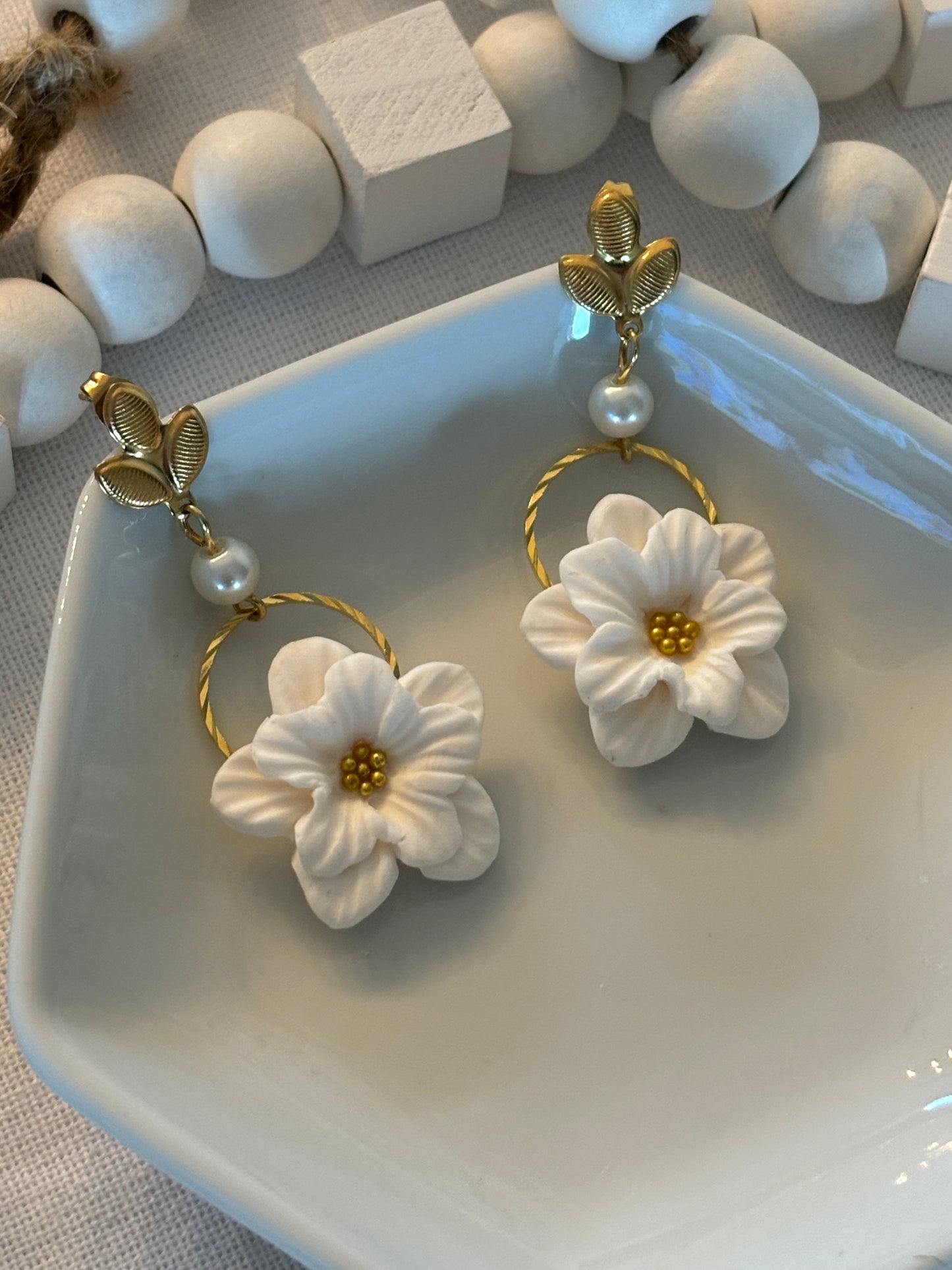 White flowers on hoops