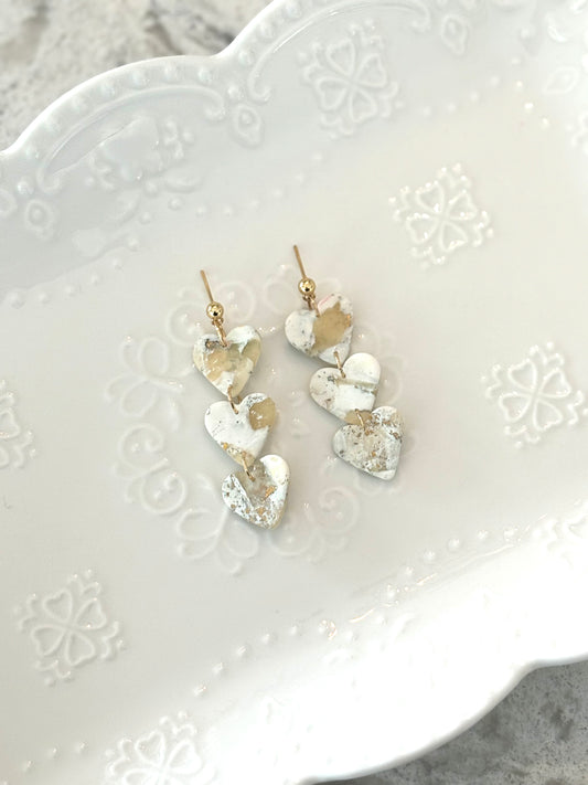 Dangly heart marble earrings